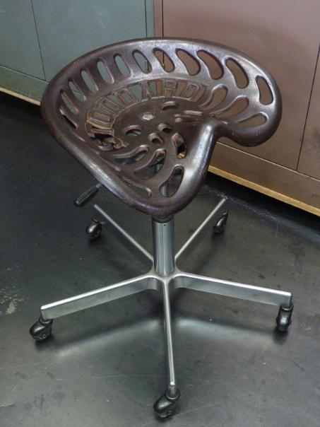 cast iron tractor seat, flamingsteel.com, steel sculpture, steel art, roy mackey