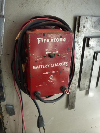vintage firestone battery charger, flamingsteel.com, steel sculpture, roy mackey